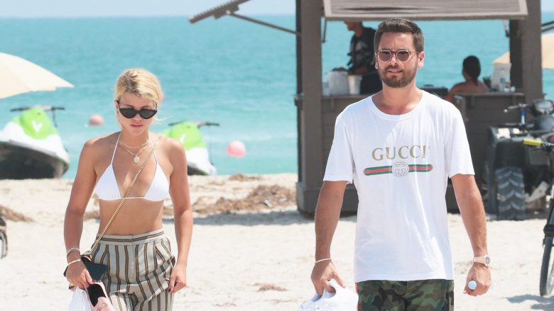 EXCLUSIVE: Hot new Hollywood couple Scott Disick and Sofia Richie share a poolside kiss as they enjoy their sun soaked vacation in Miami beach. Kourtney Kardashian's ex-partner and father to her three children engaged in a PDA with his teenage model girlfriend at an upscale waterfront hotel on Thursday (sept 21) as they relaxed in the sun after jetting into Florida earlier in the day. Fashion forward Sofia,19, looked chic in striped palazzo pants and a bikini top and accessorized her eye catching look with chunky gold jewelry and pink loafers.
<P>
Pictured: Scott Disick and Sofia Richie
<B>Ref: SPL1584952  210917   EXCLUSIVE</B><BR />
Picture by: Pichichipixx.com/KDNPIX/Splash<BR />
</P><P>
<B>Splash News and Pictures</B><BR />
Los Angeles:310-821-2666<BR />
New York:212-619-2666<BR />
London:870-934-2666<BR />
photodesk@splashnews.com<BR />
</P>