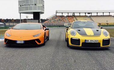 Porsche 911 dhe Lamborghini Huracan, matin shpejtësinë në pistën e garave (Video)