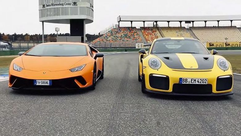 Porsche 911 dhe Lamborghini Huracan, matin shpejtësinë në pistën e garave (Video)