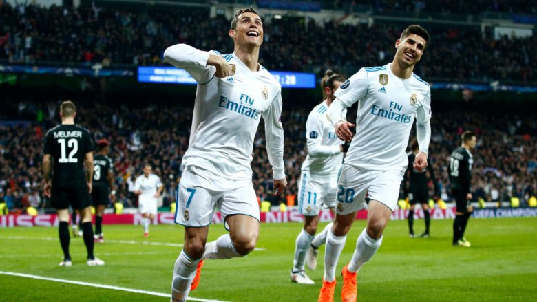 MADRID, SPAIN - FEBRUARY 14:  Cristiano Ronaldo of Real Madrid celebrates scoring the 2nd Real Madrid goal with Marco Asensio of Real Madrid during the UEFA Champions League Round of 16 First Leg match between Real Madrid and Paris Saint-Germain at Bernabeu on February 14, 2018 in Madrid, Spain.  (Photo by Gonzalo Arroyo Moreno/Getty Images)