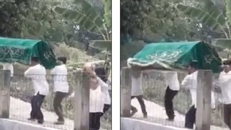 Erërat e forta ua humbin baraspeshimin katër burrave që transportonin kufomën, u rrëshqet nga duart dhe bie në pishinë (Video)