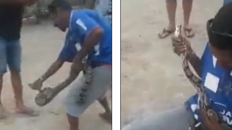 Po mundohej t’i argëtonte miqtë me gjarprin që e mbante rreth qafës, burri e pëson keq kur e kafshon në fytyrë (Video, +18)