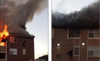 Nëna hedh foshnjën nga dritarja e katit të tretë të ndërtesës së përfshirë nga zjarri, e shpëtojnë kalimtarët e rastit (Video)