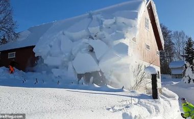 Norvegjezët përdorin një litar për të pastruar borën nga çatia e tyre, shkaktojnë një “mini-ortek” (Video)