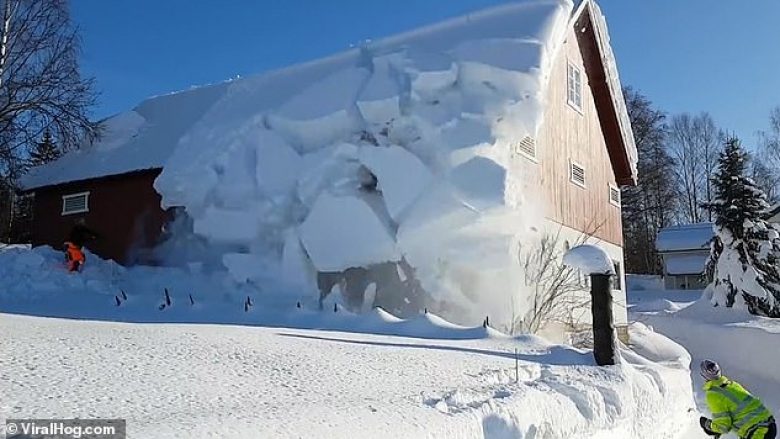Norvegjezët përdorin një litar për të pastruar borën nga çatia e tyre, shkaktojnë një “mini-ortek” (Video)