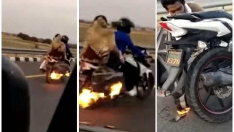 Familja indiane udhëtonte me motoçikletën e përfshirë nga zjarri, në sekondat e fundit shpëtohet nga policia (Video)