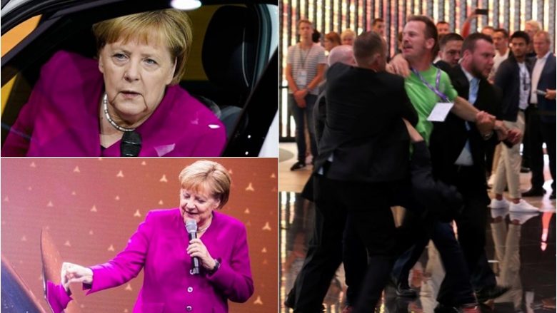Merkel hap panairin në Frankfurt, “provon” veturën e parë elektrike të VW – aktivistët mjedisorë “kishin përgatitur një befasi”