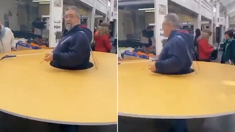 Burri në Itali përdor disk të madh rreth vetes për të mbajtur distancë nga të tjerët