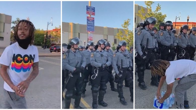 Protestuesi i afrohet kordonit të policisë amerikane për t’ua dhënë një pako me shishe me ujë: E dini se jeni të etur