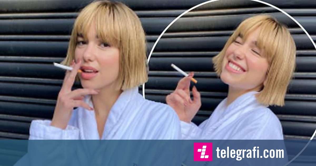 Dua Lipa poses with a new hair style while smoking a cigarette ...