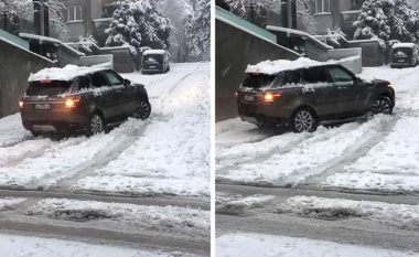 Range Rover luksoz me gomat e dimrit nuk mund të ngjitet përpjetë në rrugën me borë