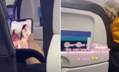 E filmoi pasagjerin duke shikuar “pornografi” në telefon derisa e dashura pranë tij flinte – pamjet bëhen virale në TikTok