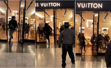 Blerësit dhe nëpunësit përpiqen të ndalojnë hajnat në dyqanin e Louis Vuitton në Nju Jork, ndërsa punëtori i sigurimit shikon dhe nuk bën asgjë