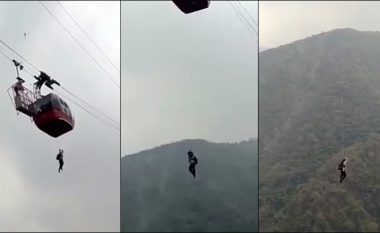 Turistët ngecën në teleferikun që u ‘bllokua’ dhjetëra metra mbi vargmalin indian – njëri guxoi të përdorte një litar për të ‘zbritur në tokë’
