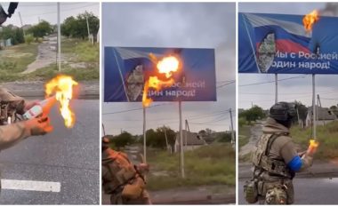 Pas çlirimit, ushtari ukrainas i vë zjarrin me koktej molotovi billboardeve propaganduese ruse në Kharkiv
