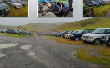 Brenda varrezës së veturave në fushat e gjelbëruara të Uellsit, aty ku Range Roverët luksoz po ndryshken