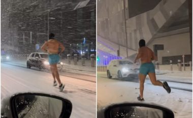 Burri në Londër tronditi të gjithë kur doli për vrap vetëm me pantallona të shkurtra derisa po binin reshje të mëdha bore
