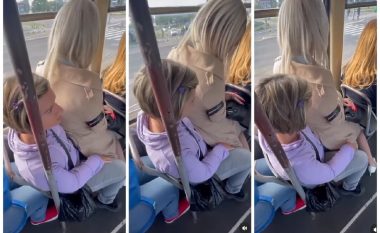 I tha se po i dhëmbin këmbët, vajza nga Beogradi ulet në prehrin e të moshuarës në tramvaj