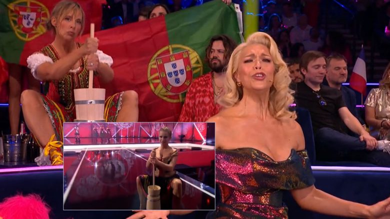 Momenti më bizar i Eurovisionit u vu në skenë nga komikja Melanie Giedroyc, prezantuesi nuk mund ta mbante të qeshurën