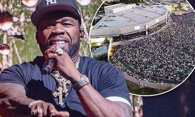 A woman gives birth to a child while watching 50 Cent's concert