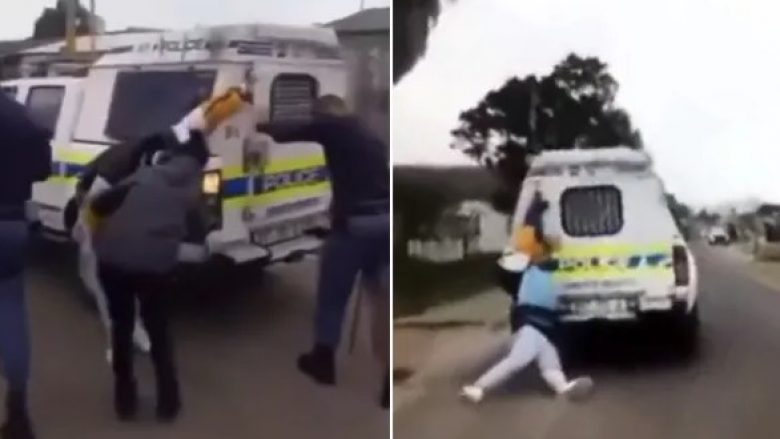 Policia ia lidh dorën për furgoni dhe e tërheq zvarrë një person në Afrikën e Jugut