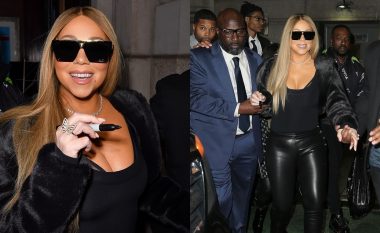 Mariah Carey tregon dekoltenë e saj me një veshje të zezë dhe dollakë lëkure ndërsa në koncertin e saj