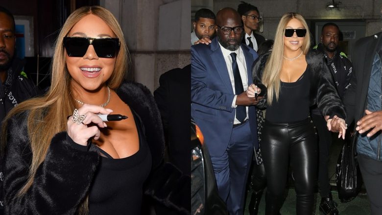 Mariah Carey tregon dekoltenë e saj me një veshje të zezë dhe dollakë lëkure ndërsa në koncertin e saj