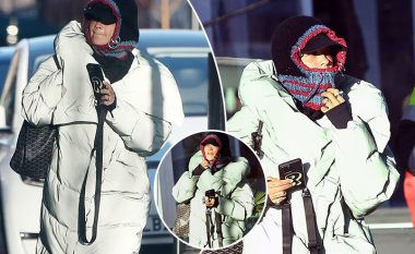 Rita Ora mezi njihet nga xhaketa e saj e trashë dhe kapuçi dimëror teksa mundohet të përballojë të ftohtin e temperaturave në minus