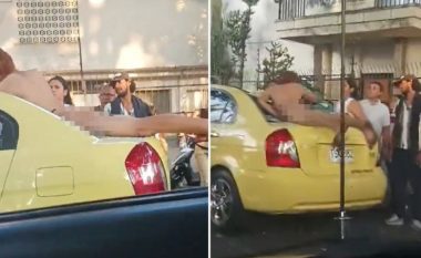 Misteri në qendër të Medellinit – një burrë lakuriq u shfaq në çatinë e një taksie