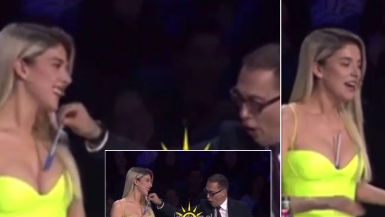 Moment i sikletshëm – Adi Krasta ia vë stilolapsin në mes të gjoksit Arilena Arës në transmetim live