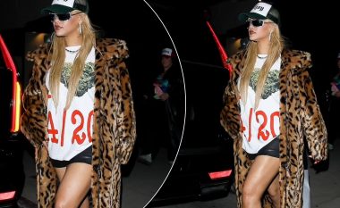 Rihanna shfaq këmbët e saj tërheqëse me një minifund dhe një pallto leshi, gjatë një feste në Los Angeles