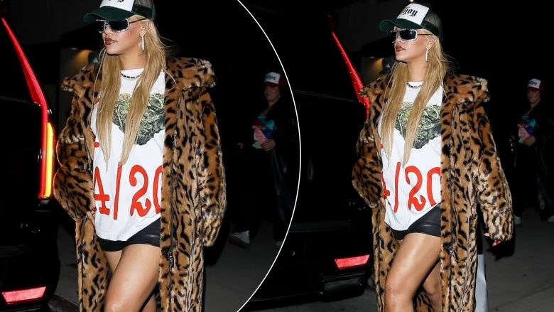 Rihanna shfaq këmbët e saj tërheqëse me një minifund dhe një pallto leshi, gjatë një feste në Los Angeles